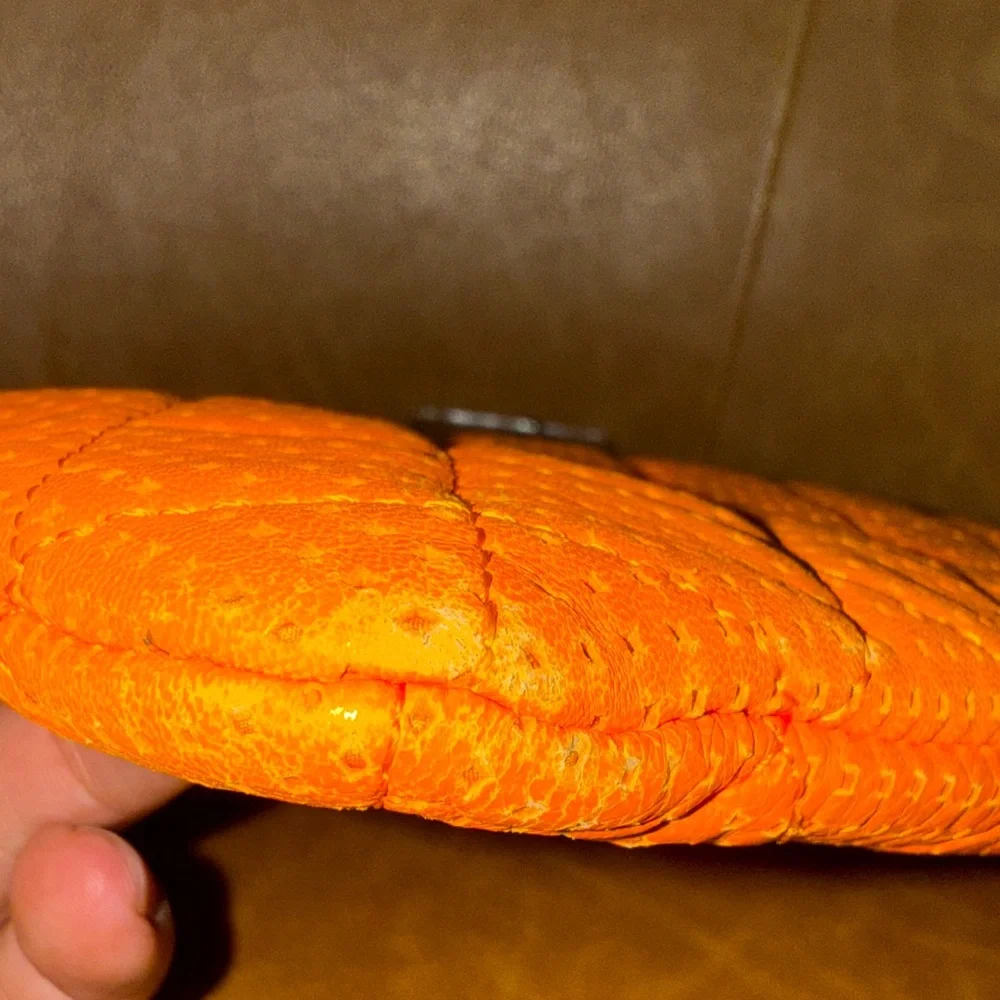 Chanel orange perforated quilted leather O case clutch pouch NWOT